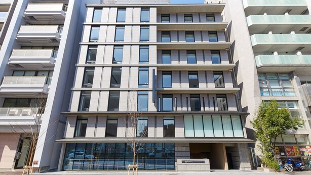 A multi-story building with a modern architectural design, featuring a series of balconies and large windows. - hotel MONday Kyoto Marutamachi (Kyoto)
