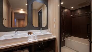 Separate tub and shower, deep soaking tub, hair dryer, bidet