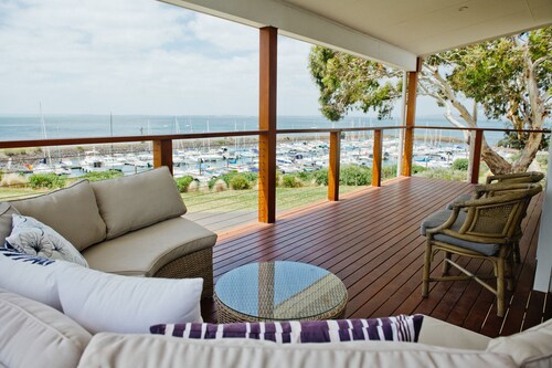 Stunning water views with heated swim/spa near to public boat-ramp, beach, shops