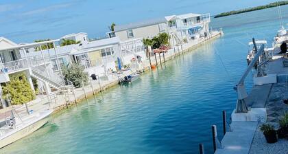 Open Water View from porch , golf cart, dock, bikes, kayaks, trailer parking