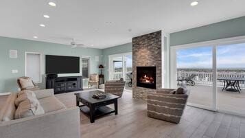 Smart TV, fireplace, DVD player, books