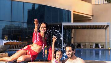 Outdoor pool, open 6:00 AM to 9:00 PM, sun loungers
