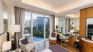 Room, 1 King Bed, Pool View | Minibar, in-room safe, individually decorated, individually furnished