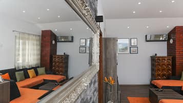 Apartment (Two Bedroom Apartment) | Living room | Flat-screen TV