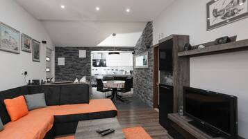 Apartment (Two Bedroom Apartment) | Living room | Flat-screen TV