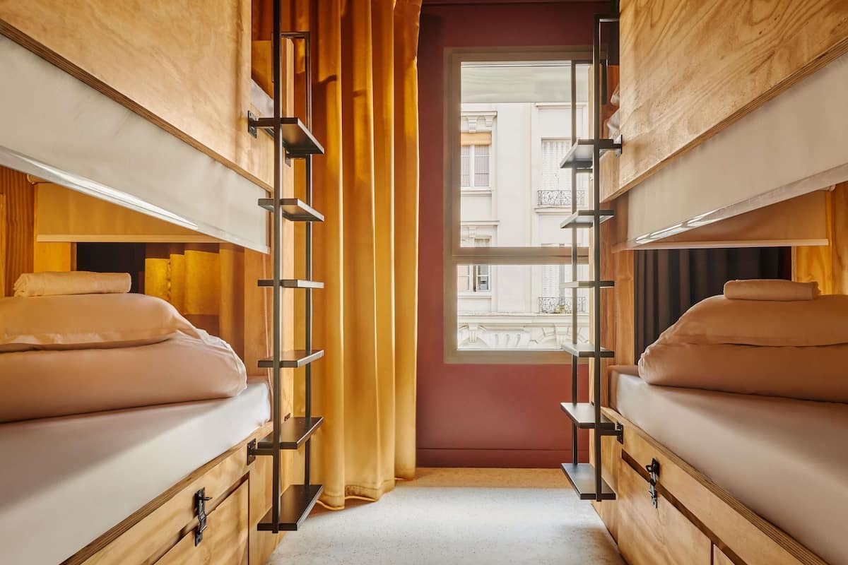 Blackout curtains, soundproofing, free WiFi, bed sheets