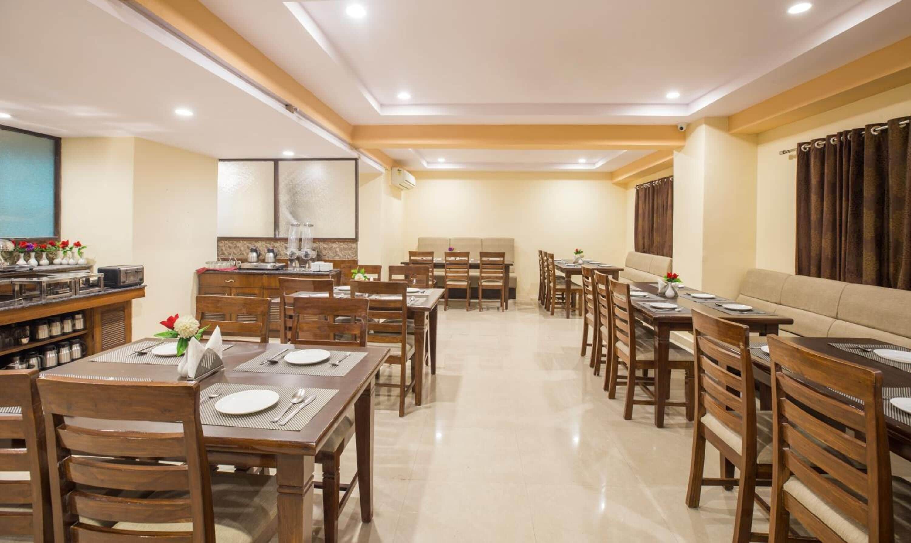 Breakfast, lunch, dinner served; Indian cuisine, al fresco dining 