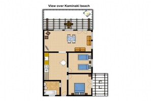 Plano de planta de un hotel con cocina, comedor, dos dormitorios, un baño y vistas a la playa de Kamina.