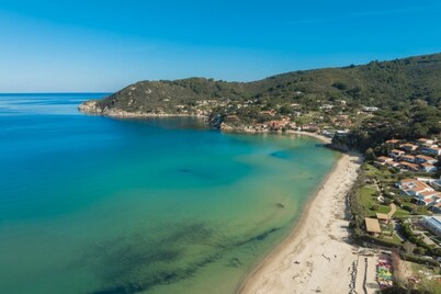 Prestigious Villa on the sandy beach named Biodola, with a stunning sea view, a private parking acce