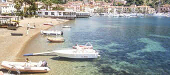 Nila in the seaside village of Porto Azzurro