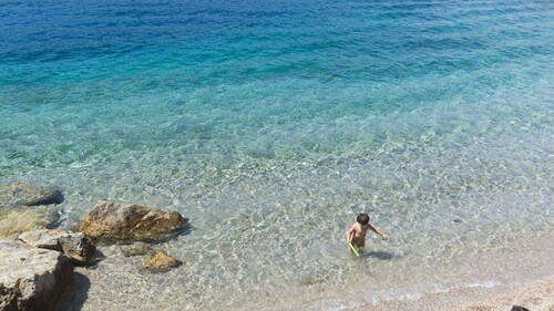 Brand new apartament on the seafront of Porto Azzurro, in front of the small beach "La Pianotta"