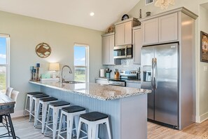 Fridge, microwave, dishwasher, coffee/tea maker