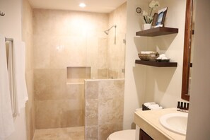 Shower, hair dryer, towels, soap