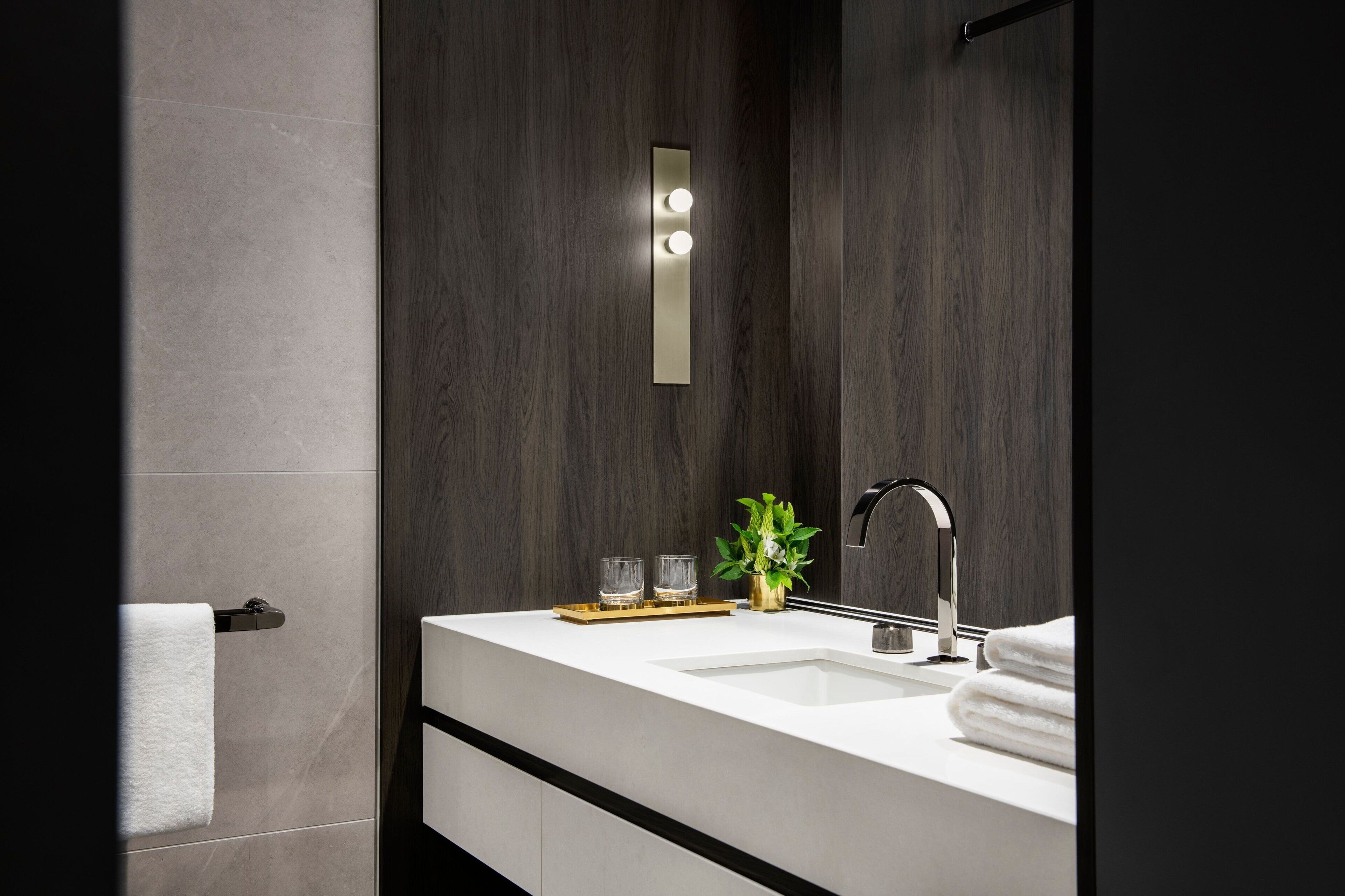 designer toiletries, hair dryer, bathrobes, towels