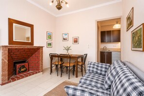 TV, fireplace, DVD player, books - Foteini Apartment - Two Bedroom Apartment, Sleeps 3 (Corfu)