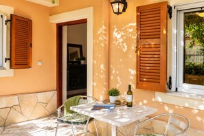 Outdoor dining - Foteini Apartment - Two Bedroom Apartment, Sleeps 3 (Corfu)