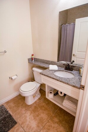 Combined shower/bathtub, hair dryer, towels, soap