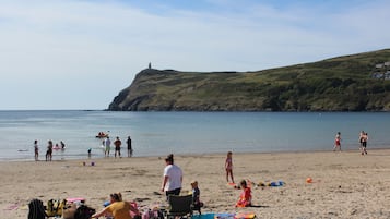 On the beach, sun loungers