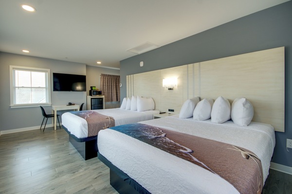 Two Queen Beds with City View | Desk, laptop workspace, iron/ironing board (on request), WiFi (free)