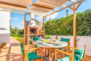 Outdoor dining - Villa Mari - Three Bedroom Villa, Sleeps 4 (Cala en Porter)