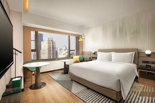 Premium bedding, down duvets, minibar, in-room safe