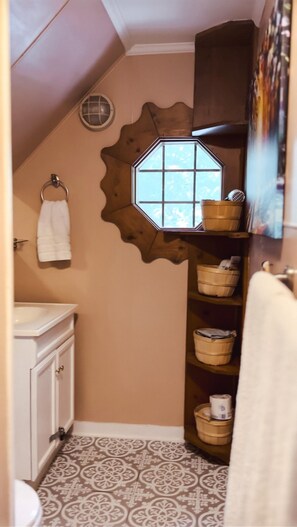 Combined shower/tub, hair dryer, towels, soap