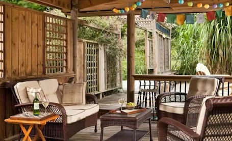Terrace/patio. Plan Your Escape to the Cottage! Minutes to Mystic, Connecticut. This pet-friendly retreat has a private fenced-in rear garden patio. Your stay includes organic breakfast, firepit, hammock, and onsite hiking trails. Up to 2 well-behaved pets welcome!
