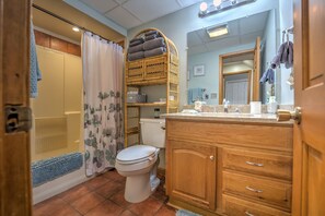 Combined shower/bathtub, hair dryer, towels, soap