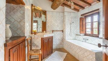 Bathtub, hair dryer, towels