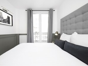 2 slaapkamers, een strijkplank/strijkijzer, gratis wifi, beddengoed