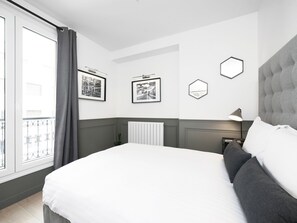 2 dormitorios, tabla de planchar con plancha, wifi gratis y ropa de cama