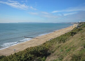 On the beach, sun loungers, beach towels