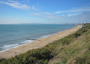 On the beach, sun loungers, beach towels