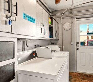 Convenient laundry facilities are available in this room.