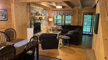 Télévision, cheminée, lecteur de DVD