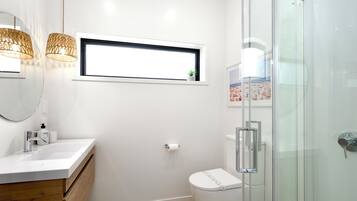 Shower, eco-friendly toiletries, hair dryer, towels