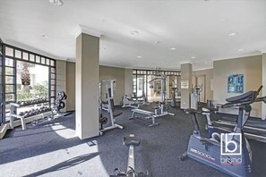 Work out in style with our fully equipped gym featuring treadmills and weightlifting equipment.