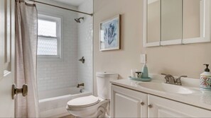 Combined shower/bathtub, hair dryer, towels, soap