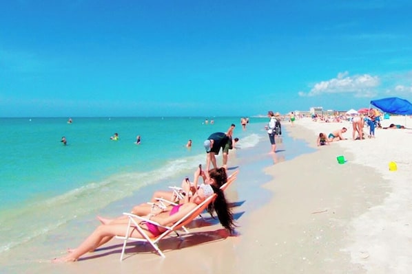 Guests can enjoy swimming and sunbathing on the beach.