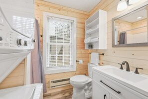 Shower, hair dryer, towels, toilet paper