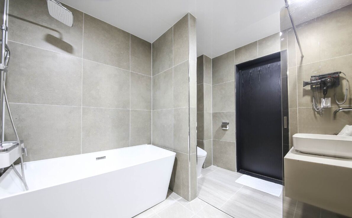 suite room | bathroom | free toiletries, hair dryer, bathrobes, soap