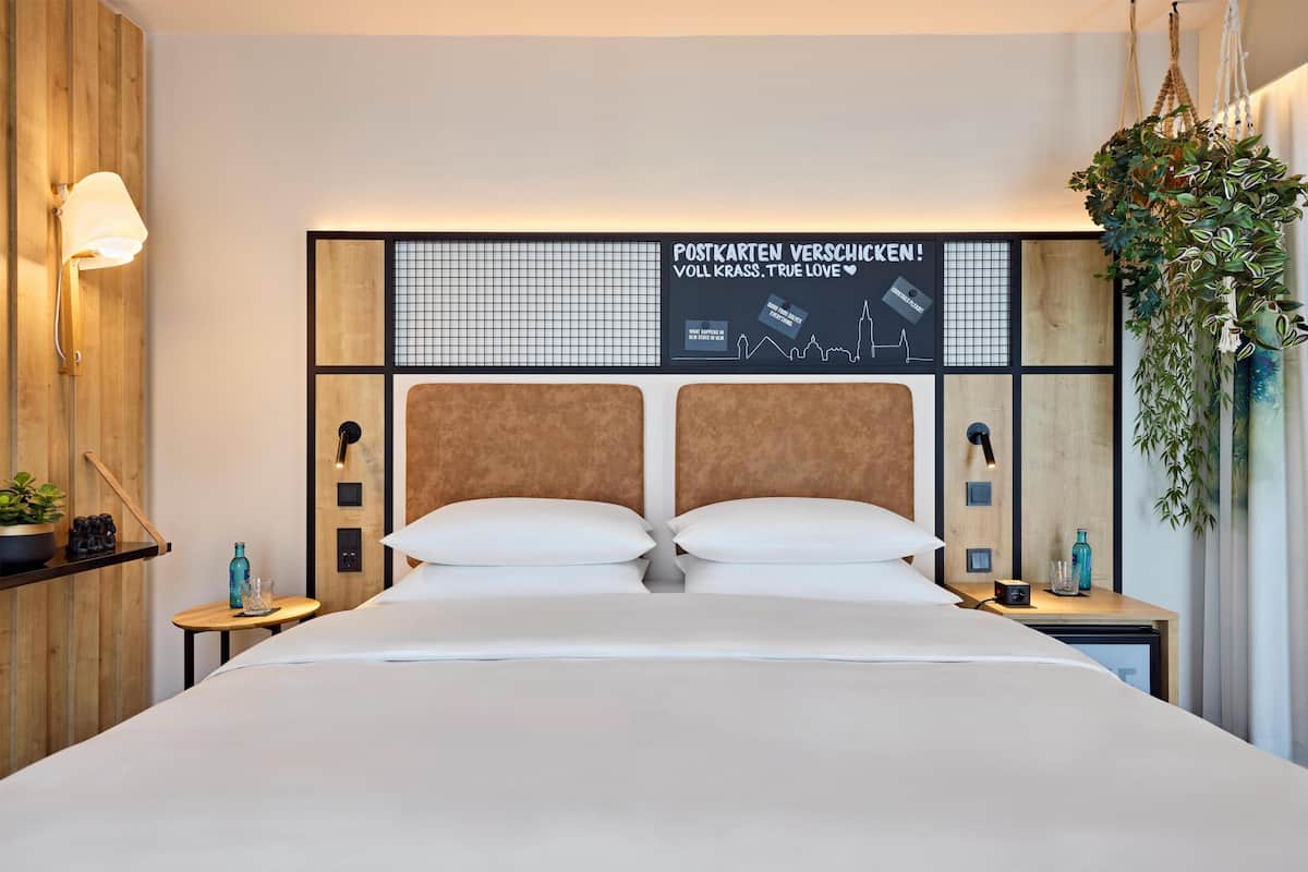 Hypo-allergenic bedding, pillow-top beds, free minibar, in-room safe