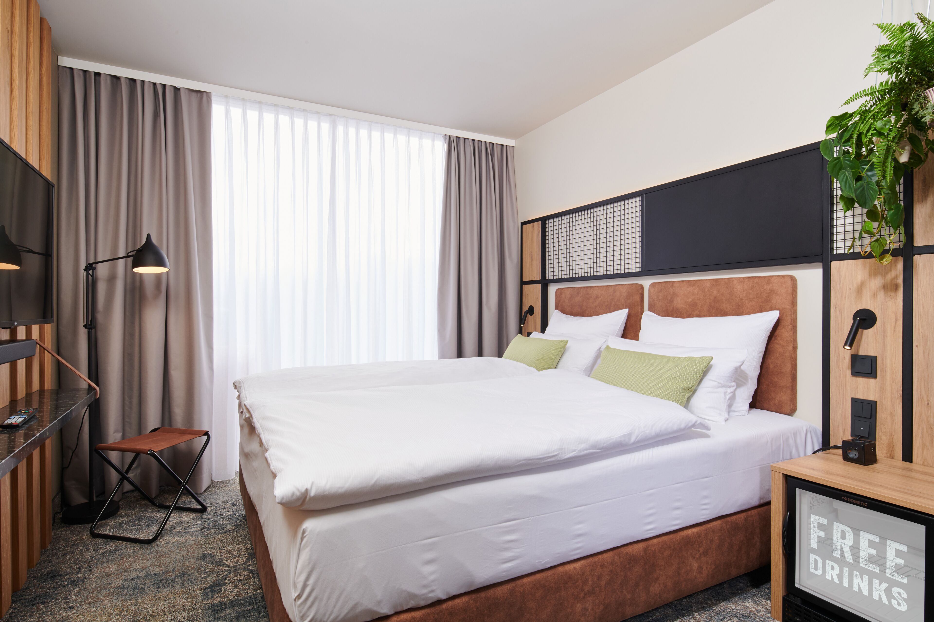 Hypo-allergenic bedding, pillowtop beds, free minibar, in-room safe