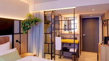 Hypo-allergenic bedding, pillow-top beds, free minibar, in-room safe