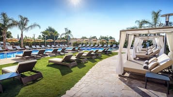 Outdoor pool, pool umbrellas, pool loungers