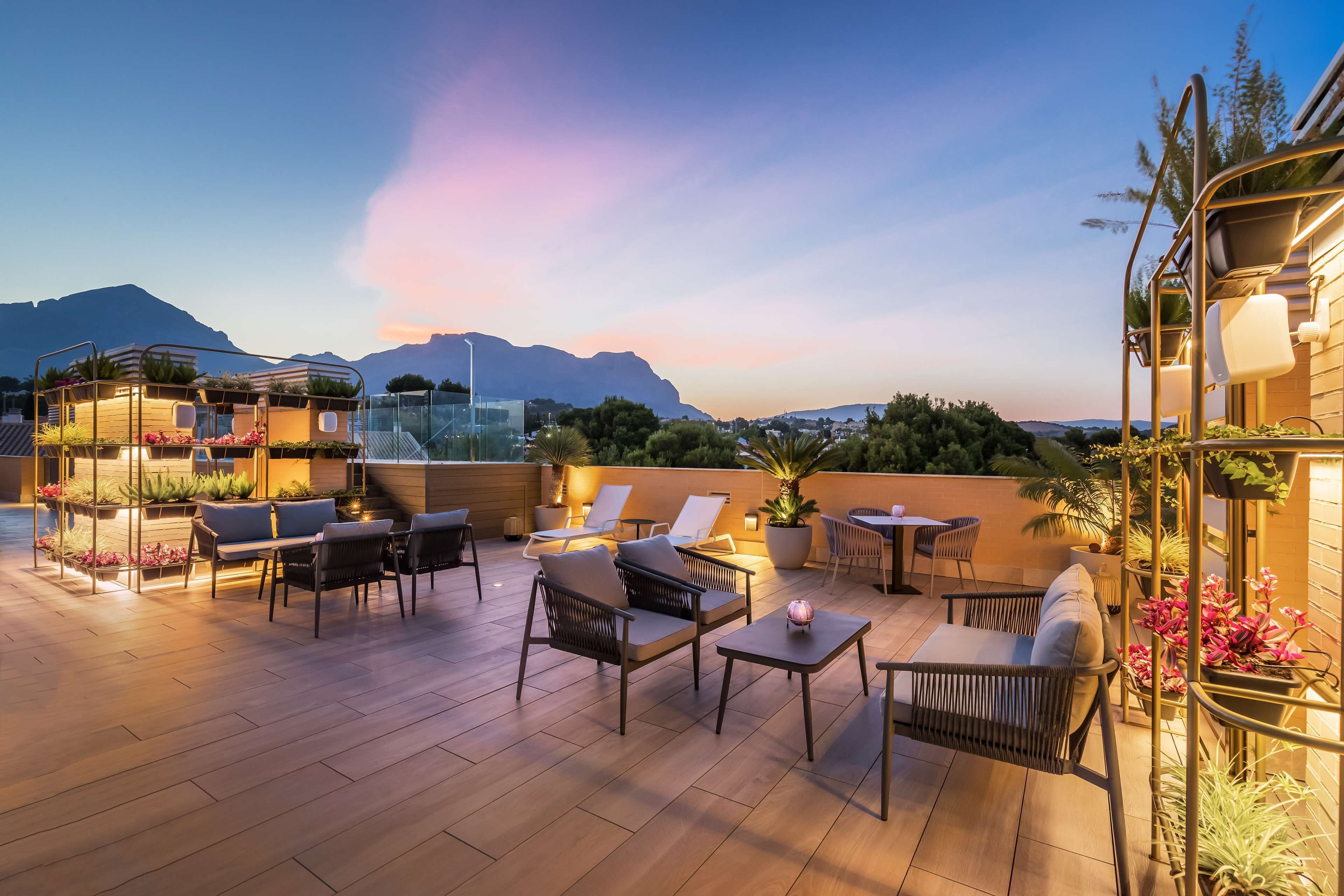 rooftop bar, poolside views, open daily