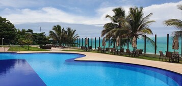 2 outdoor pools, open 7:00 AM to 10:00 PM, pool umbrellas, sun loungers