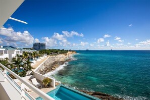 A coastal hotel with a pool, beach access, and ocean views. - Villa Farniente  | Beach Front - Located in  Magnificent Cupecoy with Private Pool (Cupecoy)