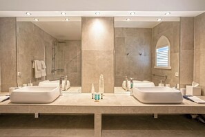 Shower, hair dryer, bathrobes, towels