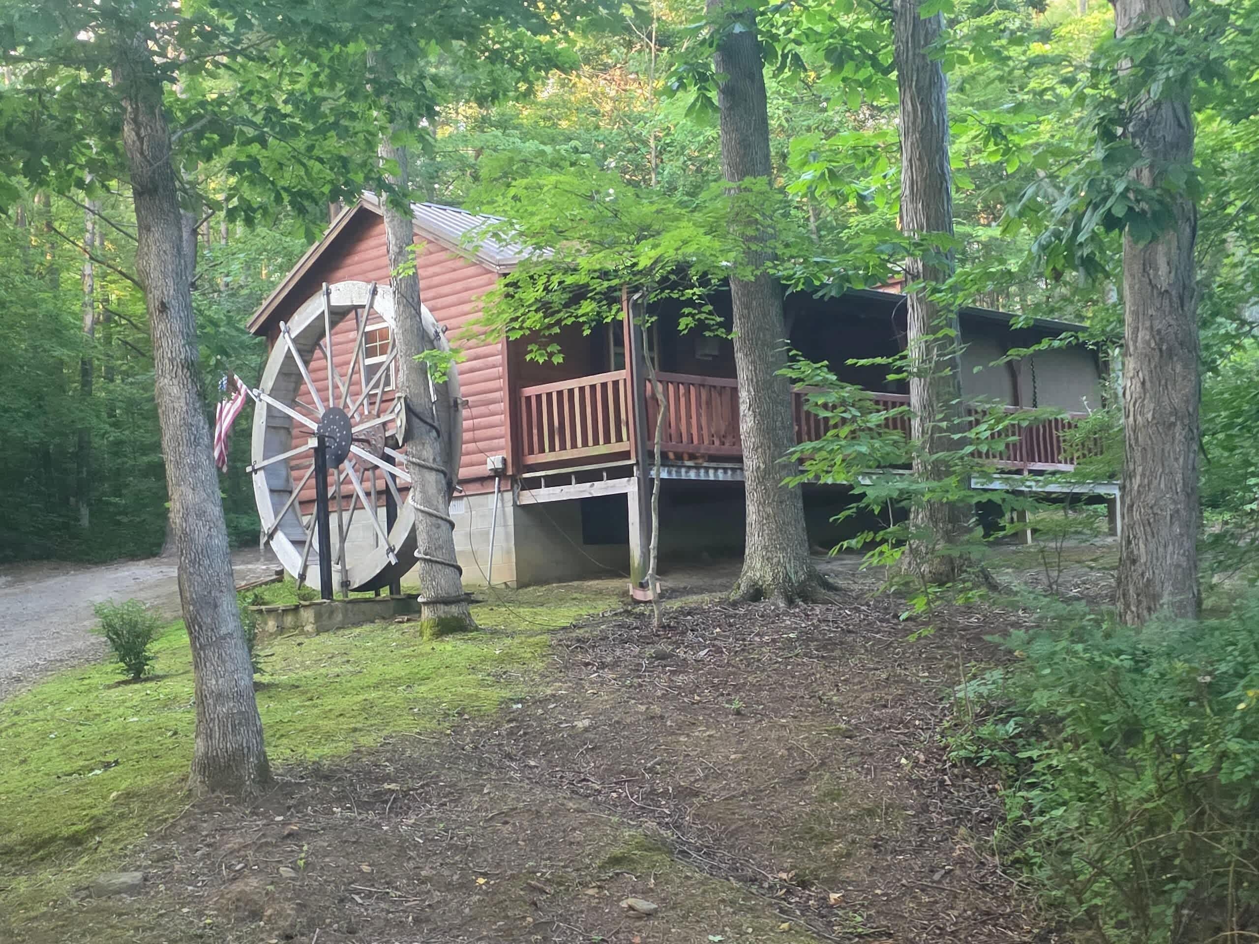 Cabin with its water wheel and deck